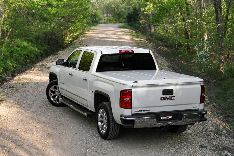 Undercover UC1096L-41, 07-13 GMC Sierra 1500 / 07-14 Sierra 2500/3500 HD 6.5ft Lux Bed Cover - Black